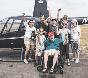 Retired Marine Corps Colonel Bill Chase poses with family and friends.